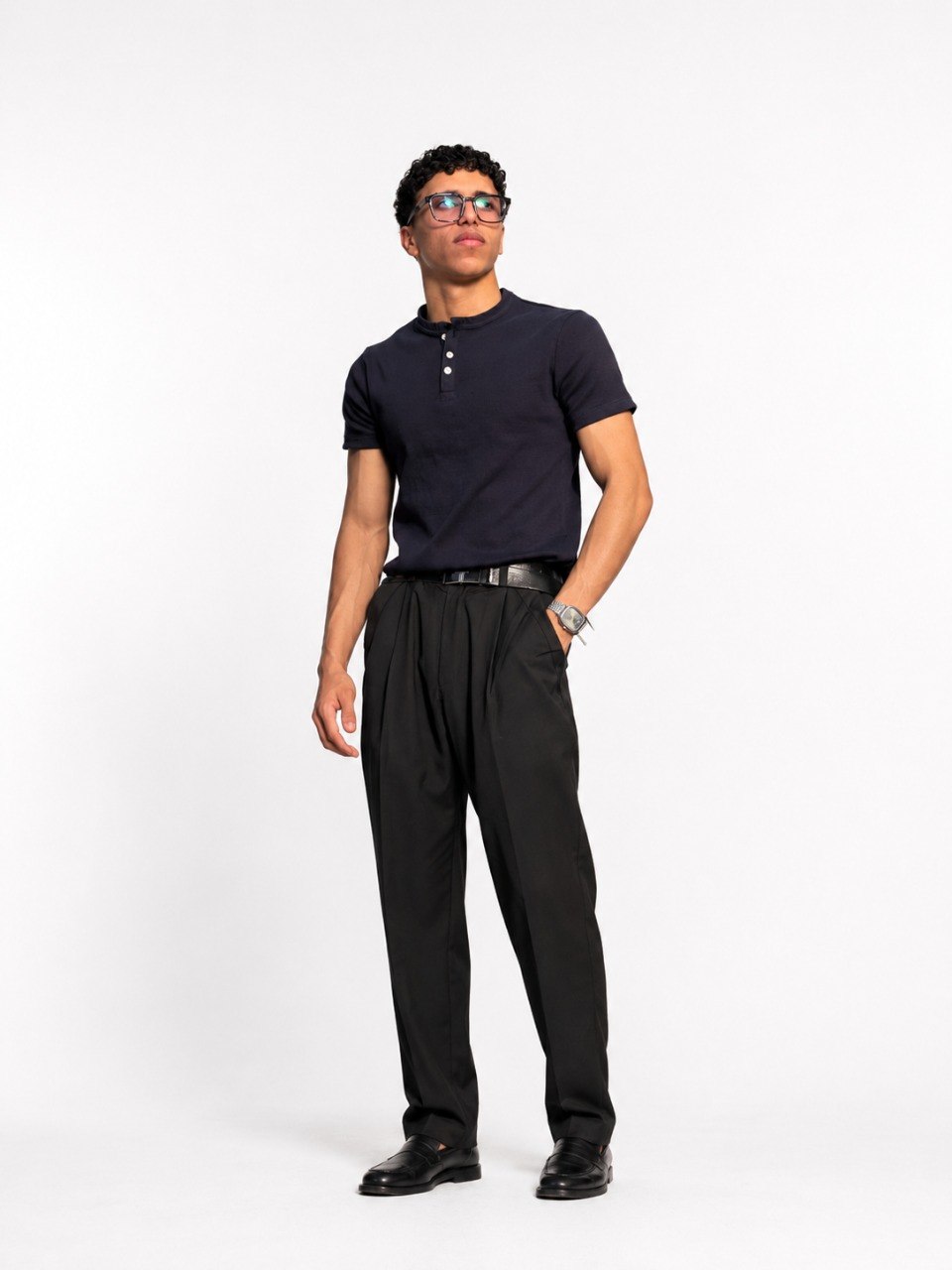 Spring navy henley shirt featuring a classic buttoned collar and long sleeves, casual and comfortable for everyday wear.