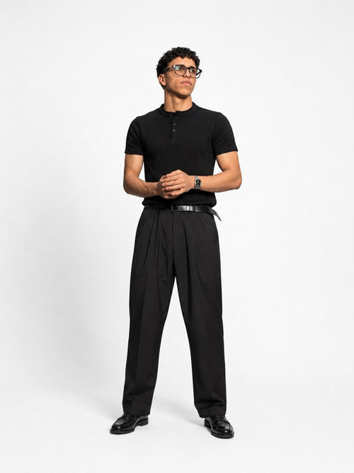 Spring black henley shirt featuring a classic button-up collar and long sleeves, displayed on a neutral background.