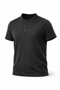 Spring black Henley shirt featuring a round neckline and button placket, displayed on a plain background.